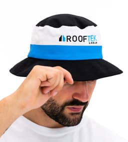 A black and white bucket hat with a blue band, featuring a logo on the front.