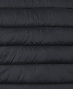 A black puffer vest featuring a quilted design, suitable for layering in cooler weather.
