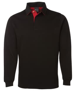 A black rugby shirt with a red collar and accents, featuring a long sleeve design and a logo.