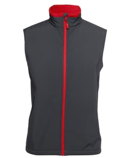 A three-layer softshell vest in dark grey with a red collar and zipper, featuring a logo.