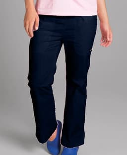 Navy scrubs pants for women featuring pockets and a logo. Worn with a pink top and blue shoes.