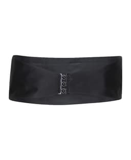 A black satin cummerbund with a sleek design and three-button fastening, featuring a branding logo.