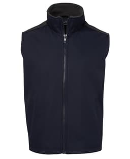 A navy vest with a high collar and zip closure, featuring a soft inner lining and shoulder details.