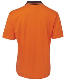 An orange polo shirt featuring a contrasting collar, designed for workwear with a logo present.