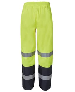 Premium rain pants in bright yellow with reflective grey stripes, featuring an elastic waistband and black lower sections.