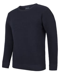 A chunky crew neck jumper in dark navy with a textured knit design. It has fitted cuffs and a simple silhouette.