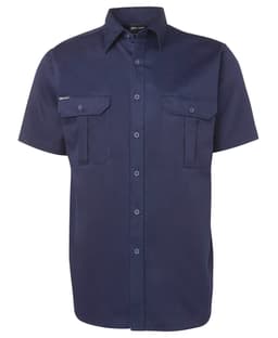 Short-sleeved navy work shirt with two front pockets and button closure. Features a logo on the label.