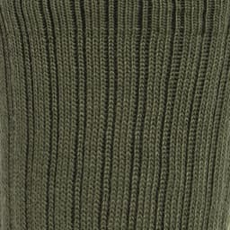 A close-up of a green knitted sock featuring a ribbed texture. The sock is part of a three-pack.