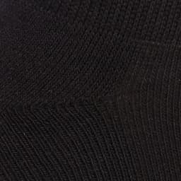 A black ankle sock featuring a textured pattern, part of a five-pack set. Includes branding on the sock.