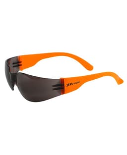 Sunglasses with a grey lens and bright orange frames, featuring branding on the temple.