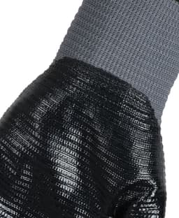 A close-up of a grey and black nitrile gripper glove, featuring textured grip and knitted wrist.