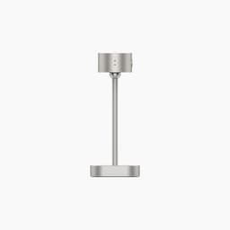A silver smart lamp made from recycled aluminium with a sleek, minimalist design and an integrated control button.