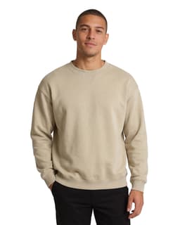 A grey adult poly cotton fleece sloppy joe jumper, displayed on a model wearing a beanie and jeans.