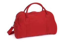 A red duffle bag with two handles and a removable shoulder strap, featuring a logo on the front.