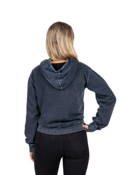 A navy stone wash fleece hoodie with a kangaroo pocket and a hood, modelled by a smiling woman.