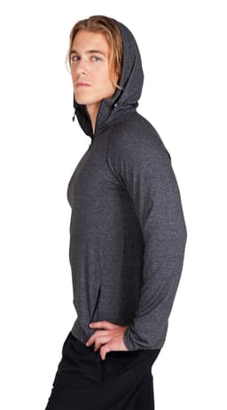 A male model wearing a grey half-hood top, featuring a fitted style and a hood. The top has a logo.