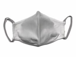 A grey face mask made from 100% cotton, featuring elastic ear loops and a smooth finish.