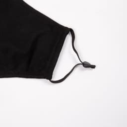 A black adult face mask with an adjustable toggle for a secure fit.