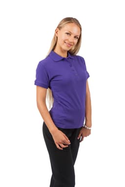 A woman poses in a purple 100% cotton pique knit polo shirt, paired with black trousers, featuring a logo.