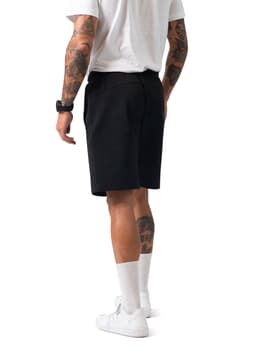 Men's cotton sandwich shorts in black, featuring a classic design and a logo, showcased from the rear with a model.