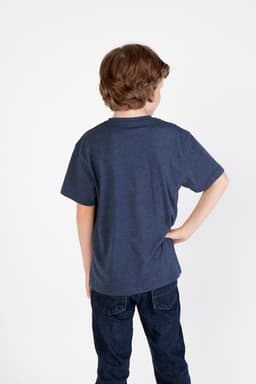 A navy blue kids' crew neck T-shirt is displayed on a child from the back, with denim jeans visible.