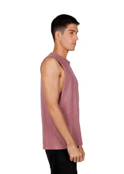 A sleeveless stone wash tank in a muted mauve colour, featuring a round neckline and a logo.