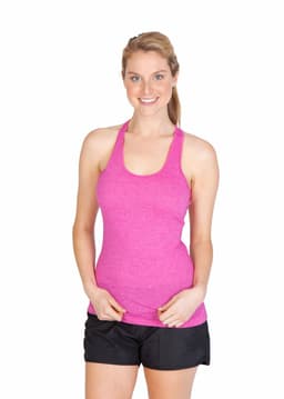 A woman poses in a pink athletic T-back singlet paired with black shorts, featuring a logo.