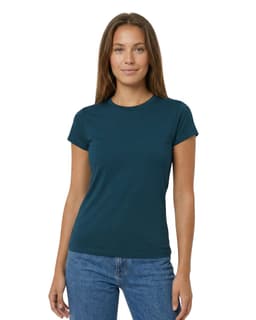 A fitted women's T-shirt in a soft teal colour displayed on a model, paired with grey sweatpants. The shirt features a logo.