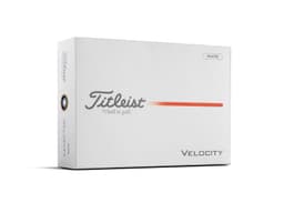 A white box containing a dozen Titleist Velocity golf balls, featuring a logo and product branding.