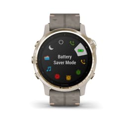 A watch with a light gold-tone case and shale grey leather band displaying the battery saver mode interface.