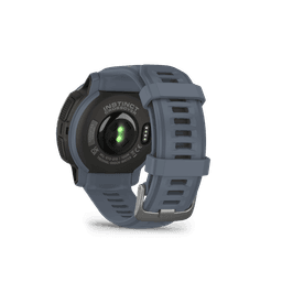 A grey Garmin Instinct Crossover watch with a textured strap and a circular face featuring a sensor on the back.