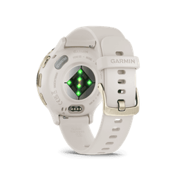 A smartwatch with a soft gold stainless steel bezel and a white strap, featuring a green heart rate sensor on the back.