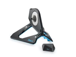 A black and blue Garmin Tacx NEO 2T Smart Trainer with a triangular base and a rear flywheel.