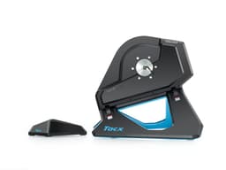 A black and blue Garmin Tacx NEO 2T Smart Trainer, featuring a sleek design and a compact shape.