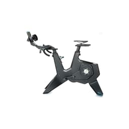 A black Garmin Tacx NEO Smart Trainer with a sleek design, featuring handlebars and a holder for devices.
