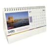 A wiro-bound desk calendar featuring a scenic cover and a printed base, sized 99x210mm.