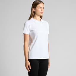 A white polo shirt with a collar and three buttons, featuring a small logo. The model stands facing to the side.