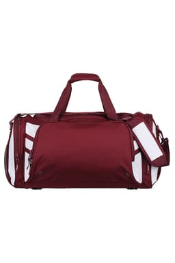 A maroon duffle bag with white accents, featuring multiple compartments and a handheld strap, plus a detachable strap.