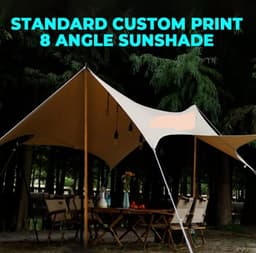 A tan canopy with eight angles set up outdoors among trees, featuring poles and hanging lights.