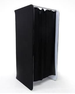 A black tension fabric change room with a white frame and four curtain panels. It features a logo.