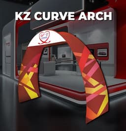 A double-sided, curved fabric arch in vibrant red and yellow patterns, featuring a logo on top.