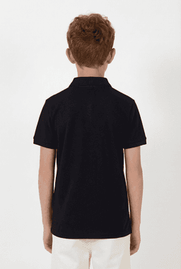 A black youth polo shirt viewed from the back, featuring a collar and short sleeves. The shirt has a logo on it.