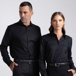 A black button-up shirt for men and women, featuring a sleek design and a subtle logo.