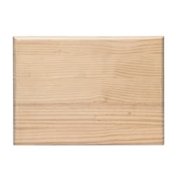 A wooden cutting board with a smooth, natural finish featuring light, pale wood tones and a simple design.