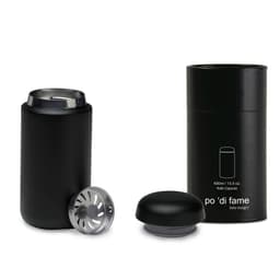 A drink bottle with a black exterior and a silver lid, accompanied by a cylindrical black container.