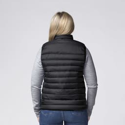 A black padded baffle vest seen from the back, worn over a grey long-sleeve top, featuring a logo.