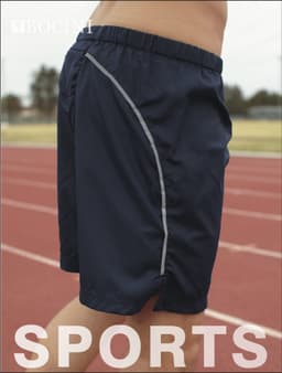 Navy athletic shorts with a grey trim and logo, designed for sports activities, displayed on a running track.