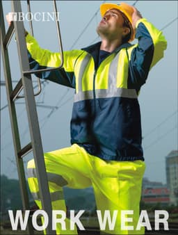 A man in a hi-vis yellow and navy jacket and pants, wearing a hard hat, stands on a ladder outdoors.