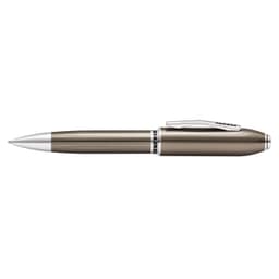 A pen in translucent titanium grey with silver accents and a retractable design. It features a logo on the barrel.