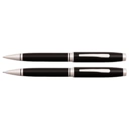 A black lacquer pen set with chrome accents, including a ballpoint and a mechanical pencil. Features a logo.